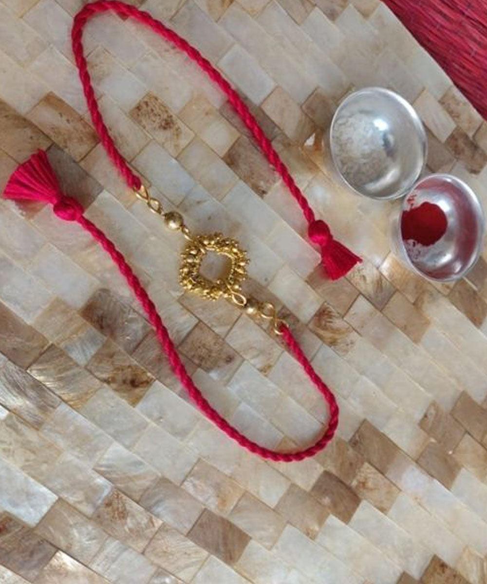 Red hand made thread rakhi