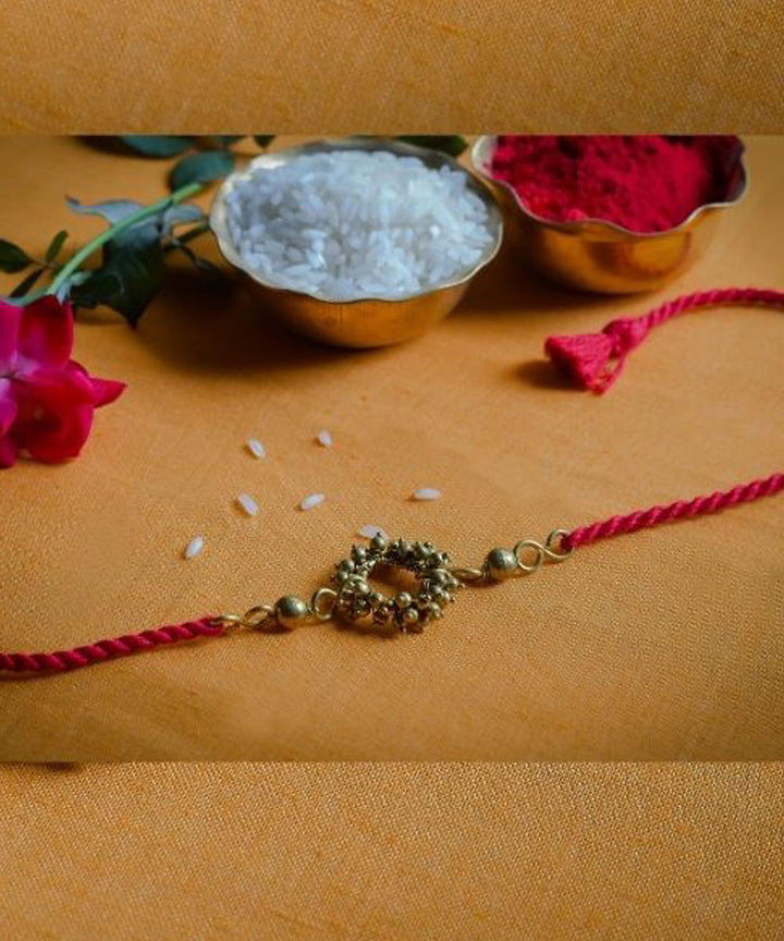 Red hand made thread rakhi
