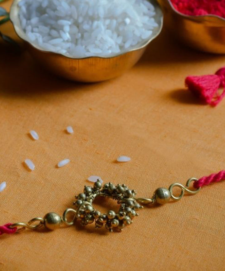 Red hand made thread rakhi