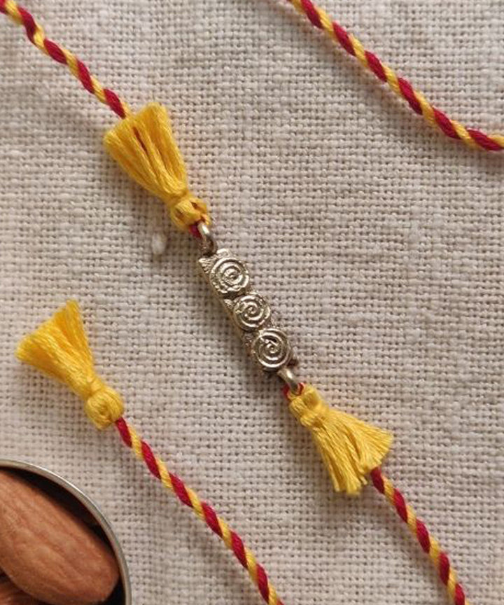 Yellow red hand made thread rakhi