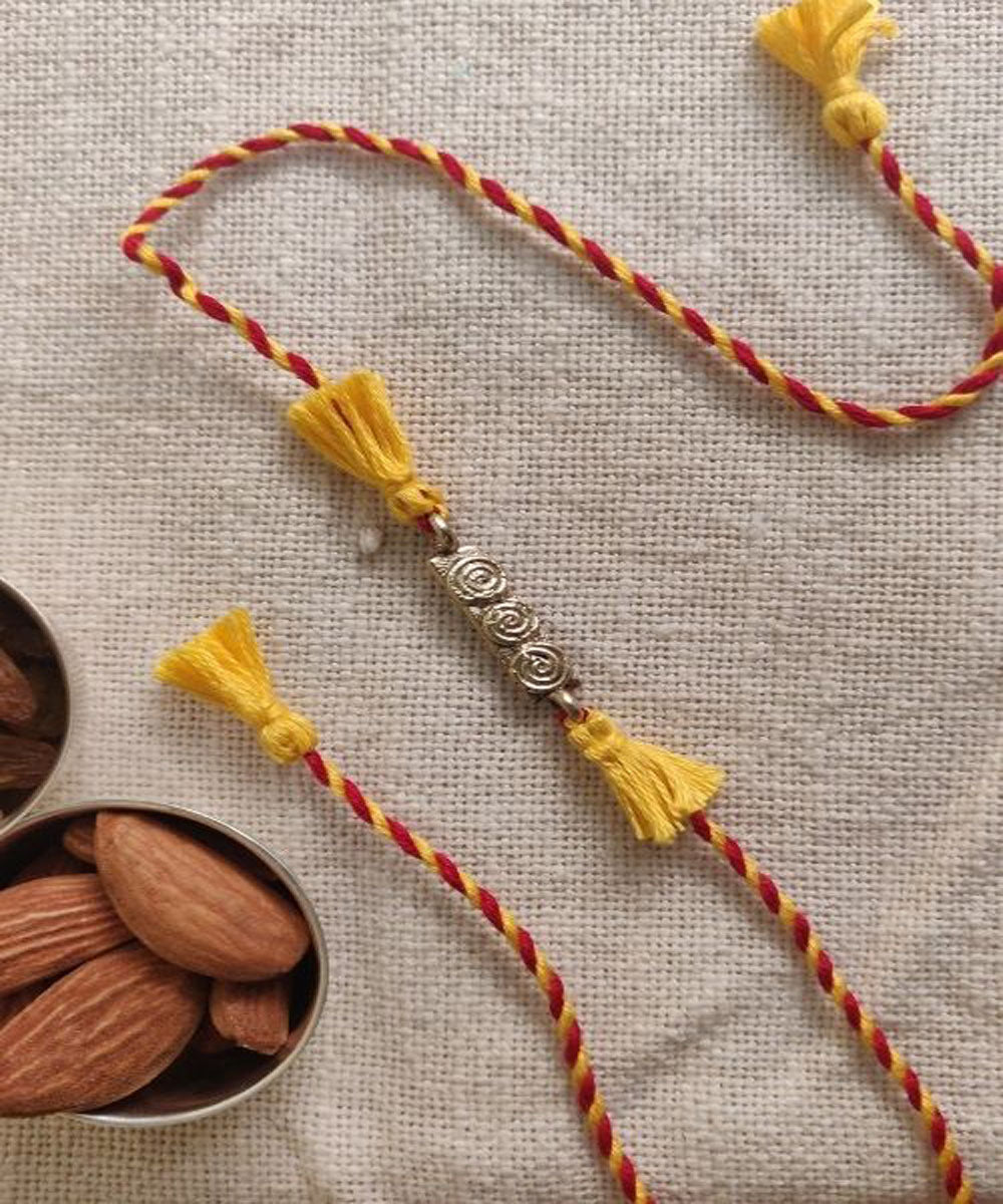 Yellow red hand made thread rakhi
