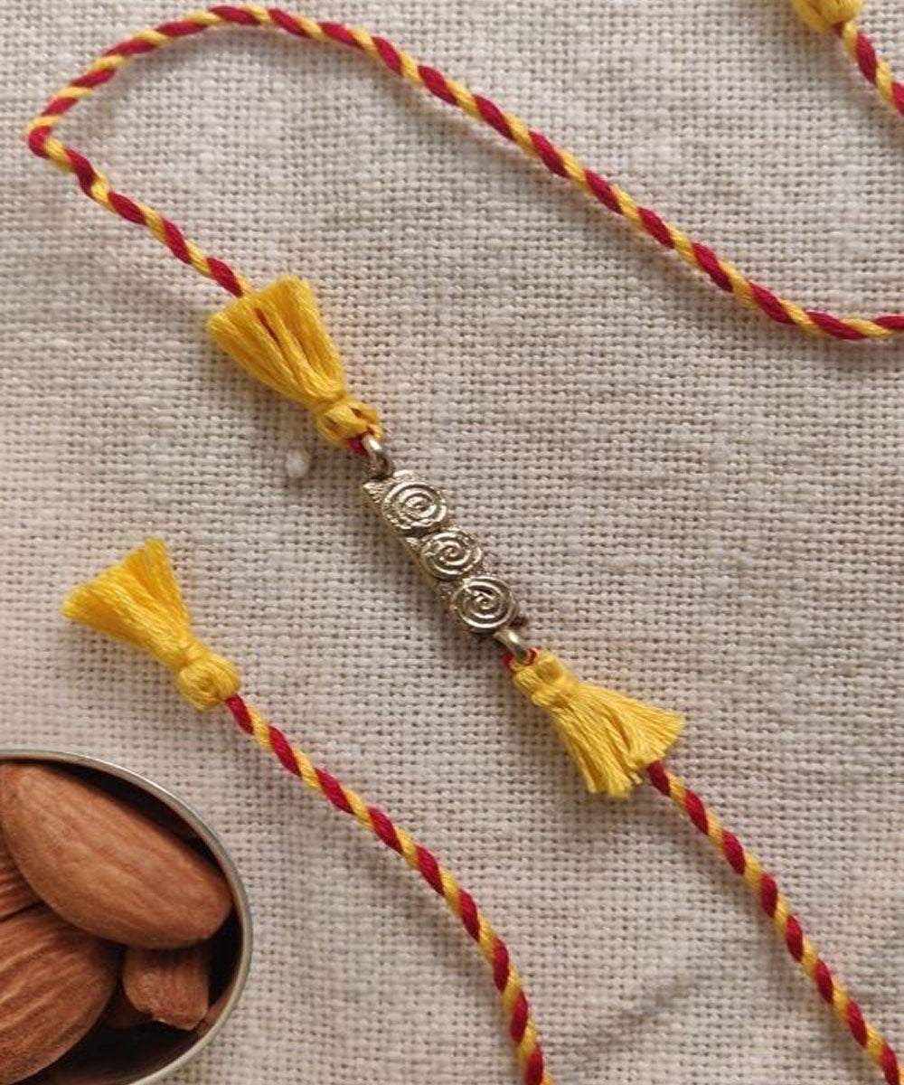 Yellow red hand made thread rakhi