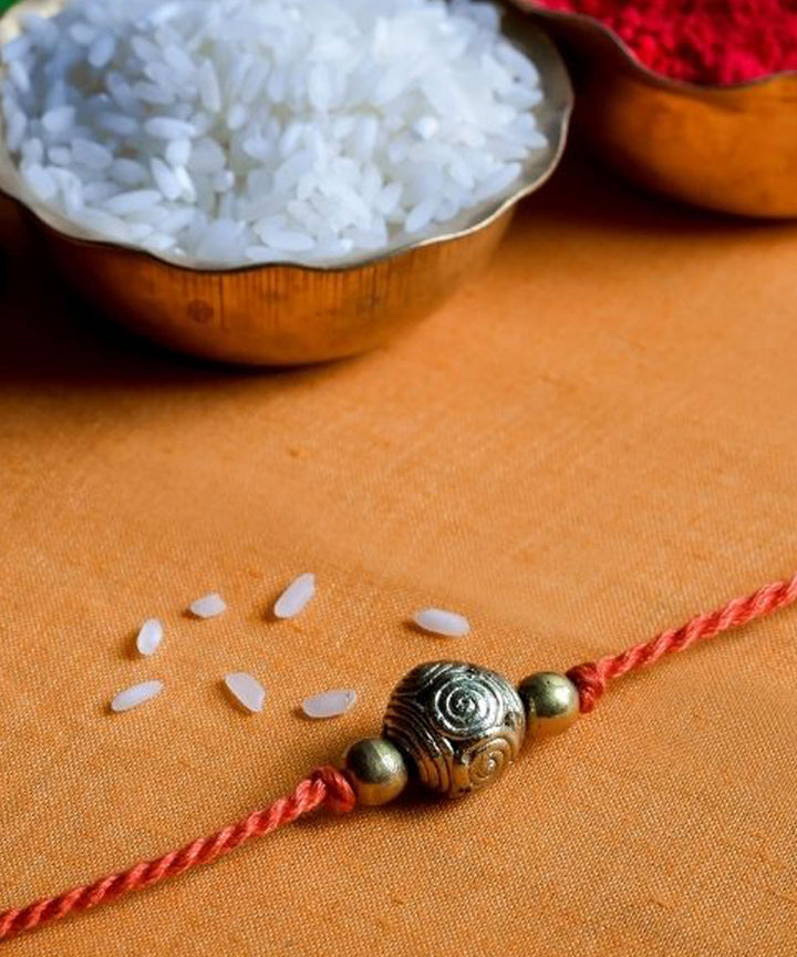 Red handcrafted thread rakhi