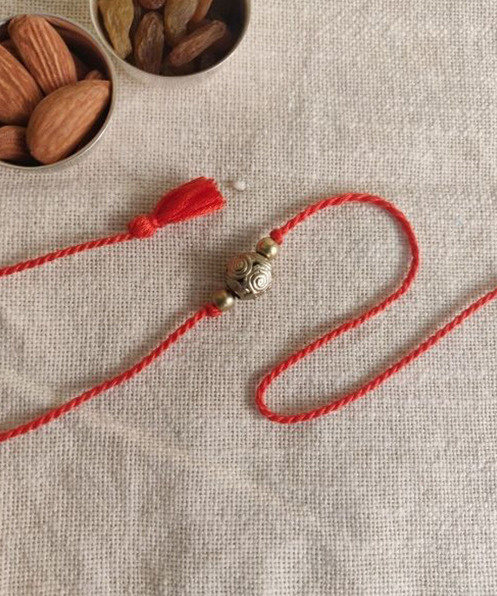 Red handcrafted thread rakhi