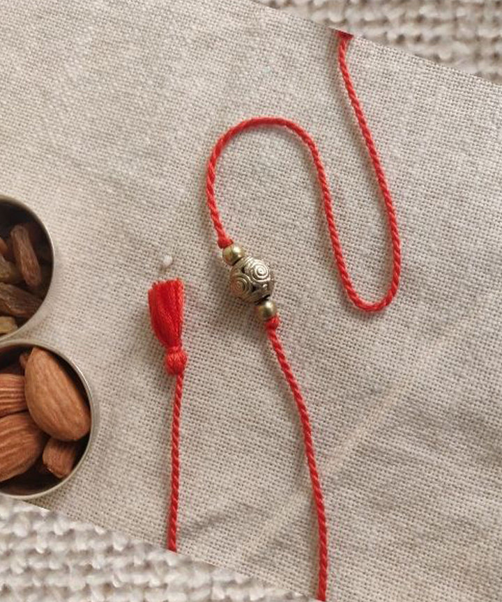 Red handcrafted thread rakhi