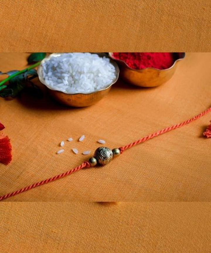 Red handcrafted thread rakhi