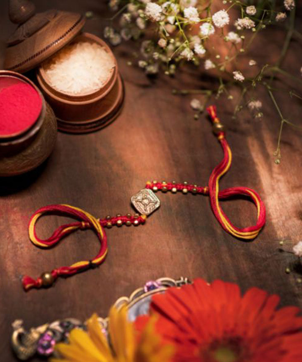 Red yellow thread handmade rakhi