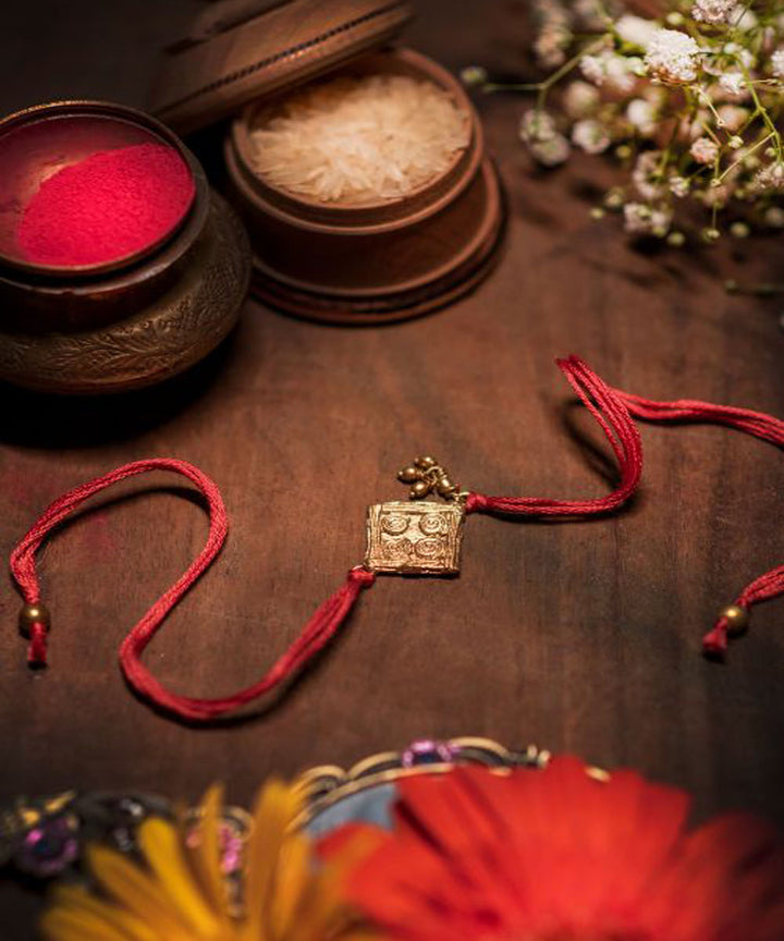 Red beautiful thread hand made rakhi