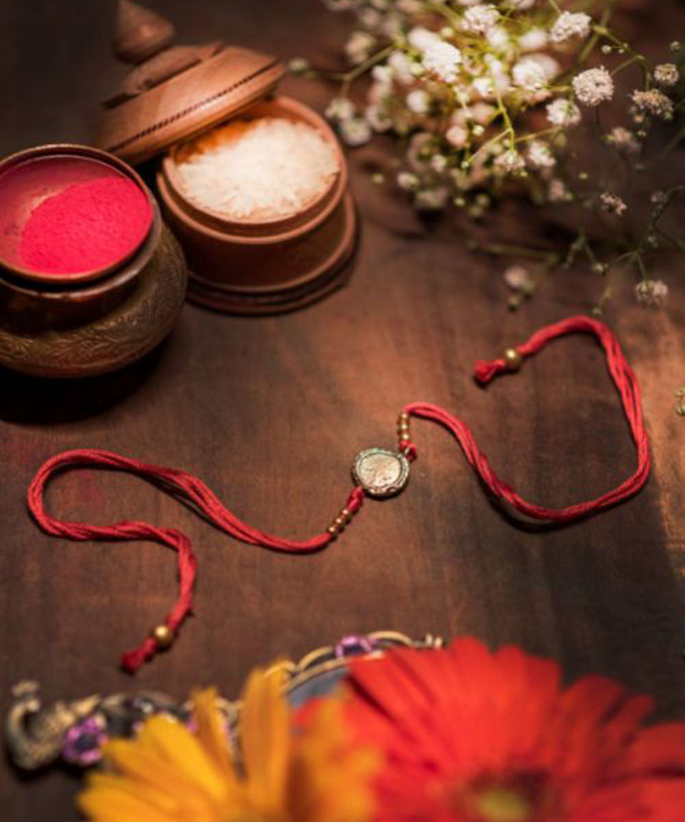 Red thread handcrafted rakhi
