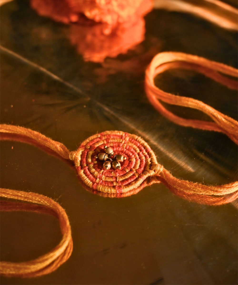 Yellow hand crafted thread rakhi