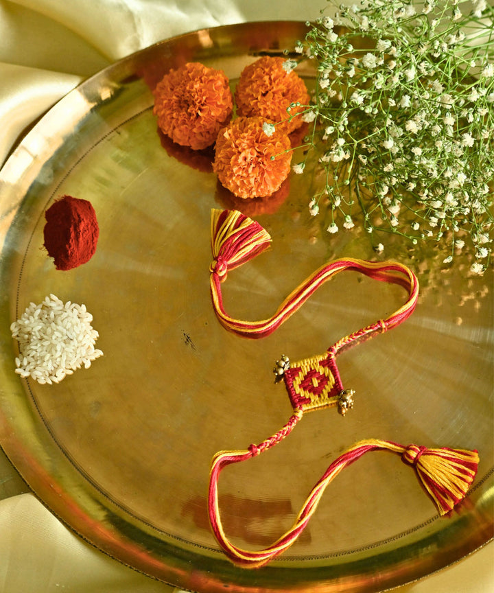 Yellow red thread hand made rakhi