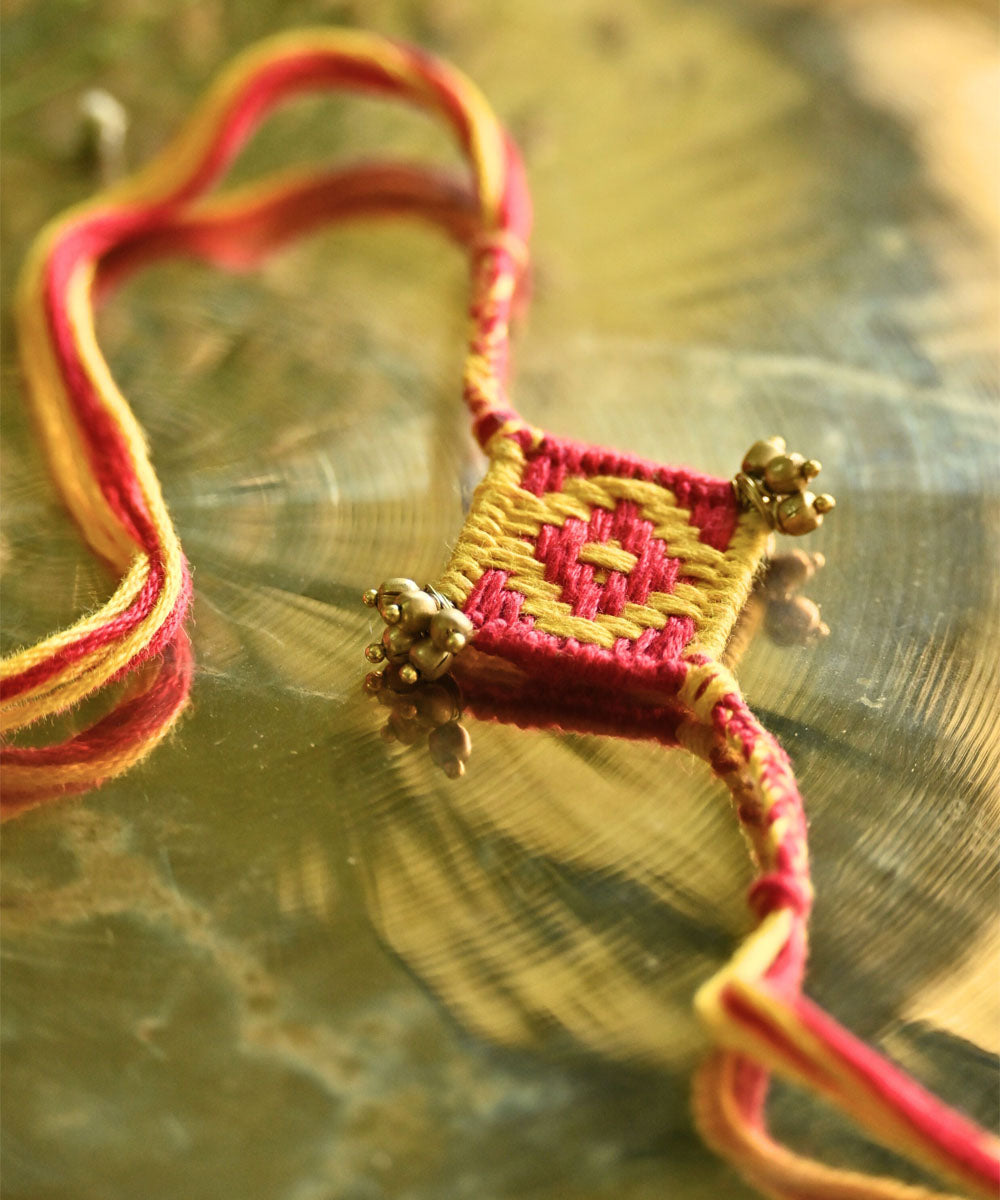 Yellow red thread hand made rakhi