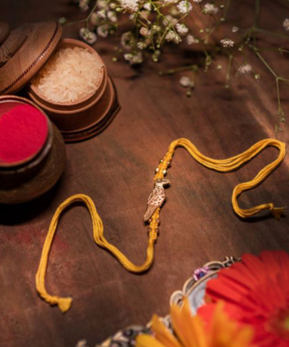Red yellow combination thread handmade rakhi