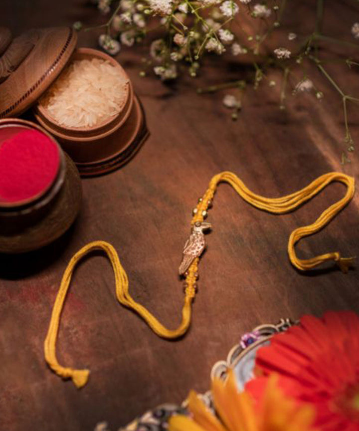 Red yellow combination thread handmade rakhi