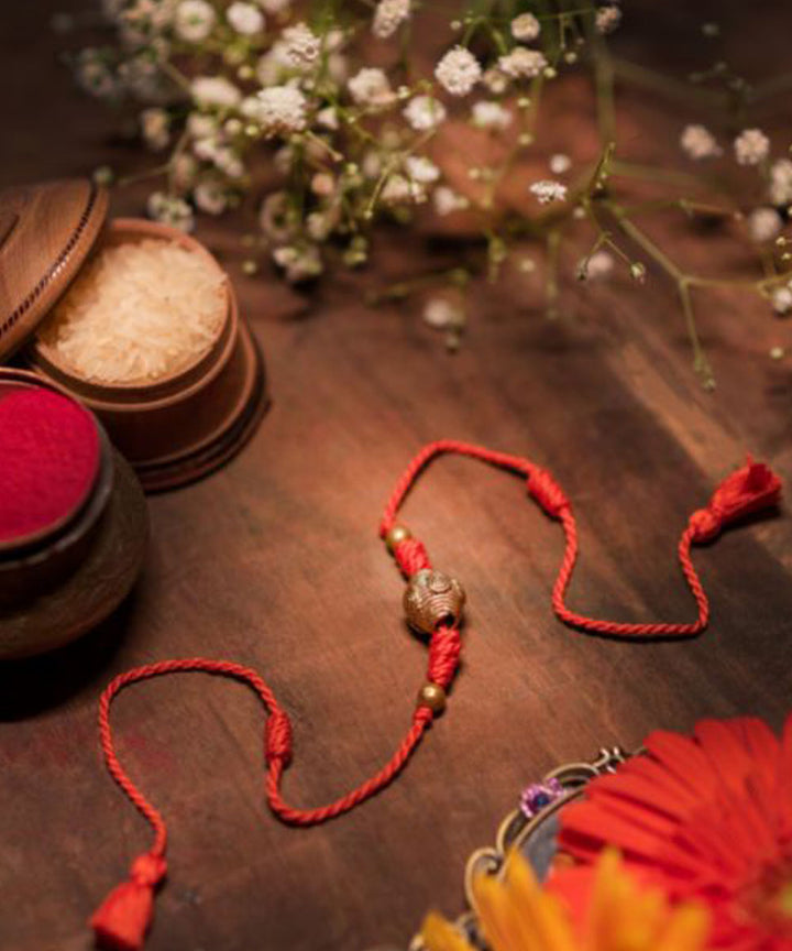 Yellow orange handmade thread rakhi