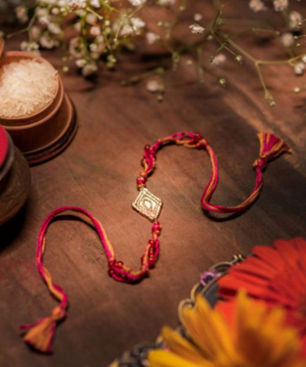 Red orange gray handmade thread rakhi