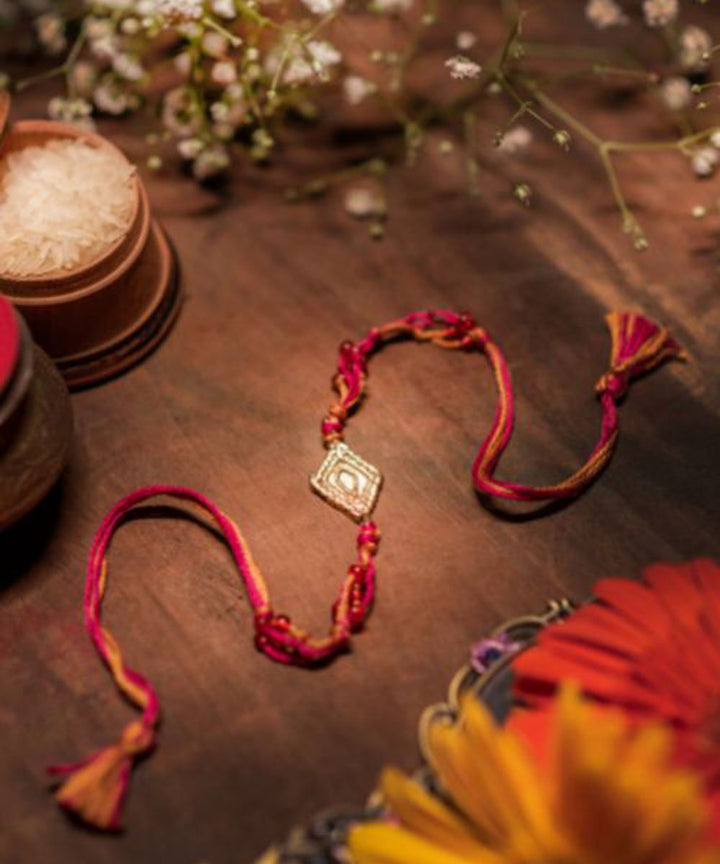 Red orange gray handmade thread rakhi