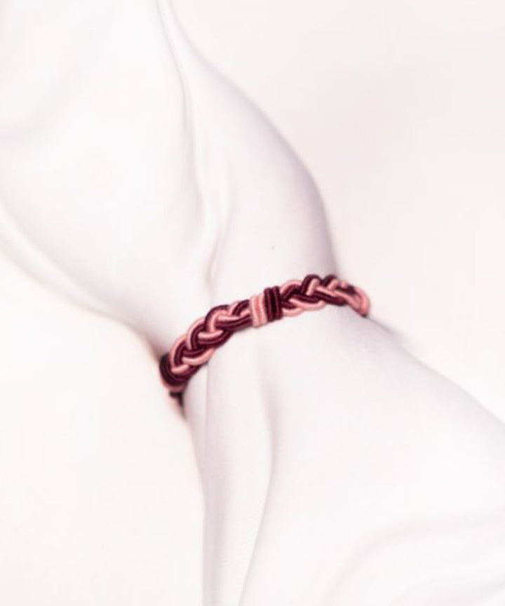 Purple pink handmade thread rakhi braclets