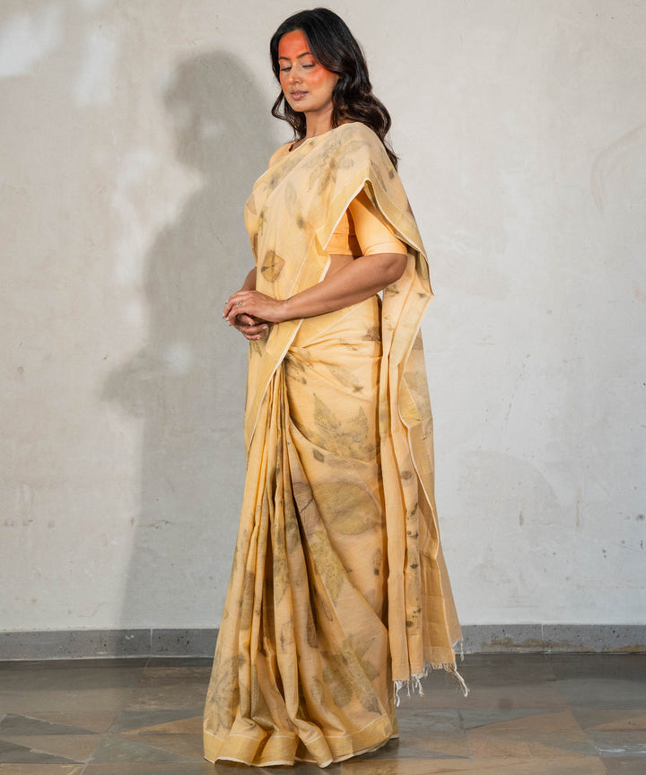 Soft pumpkin orange hand dyed with turmeric bio print cotton saree