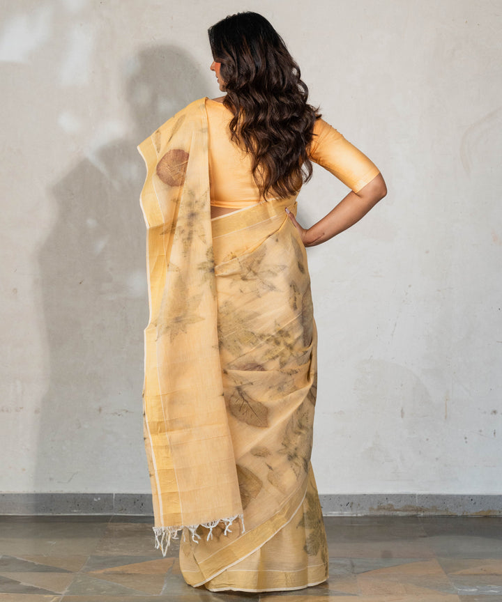 Soft pumpkin orange hand dyed with turmeric bio print cotton saree