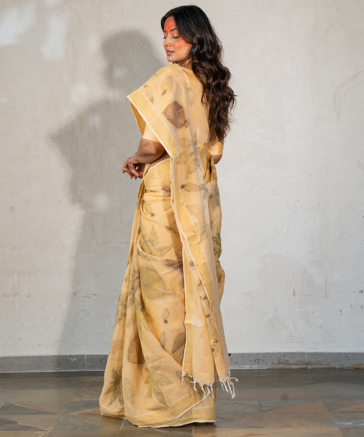 Soft pumpkin orange hand dyed with turmeric bio print cotton saree