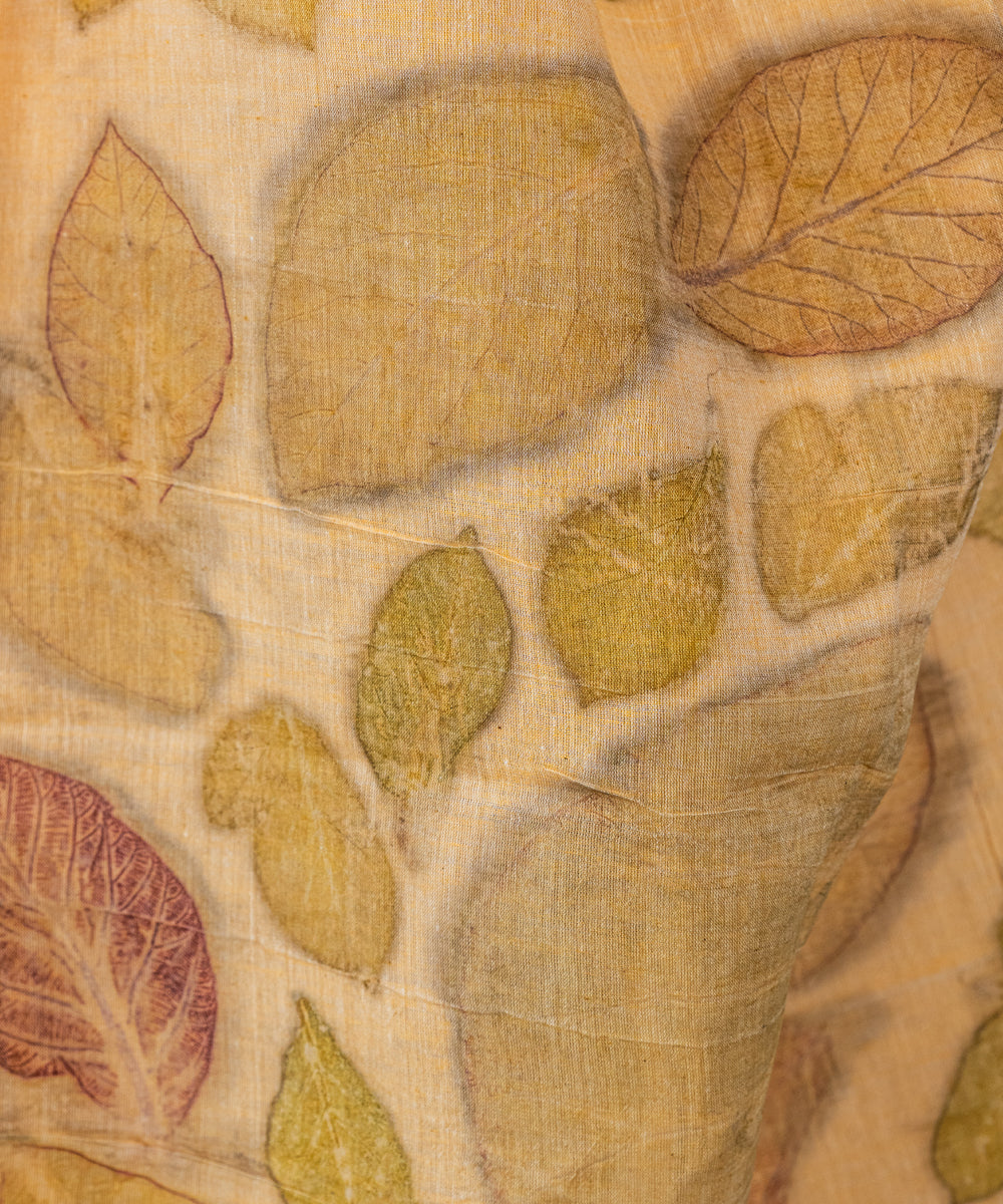 Soft pumpkin orange cotton hand dyed with turmeric bio print saree