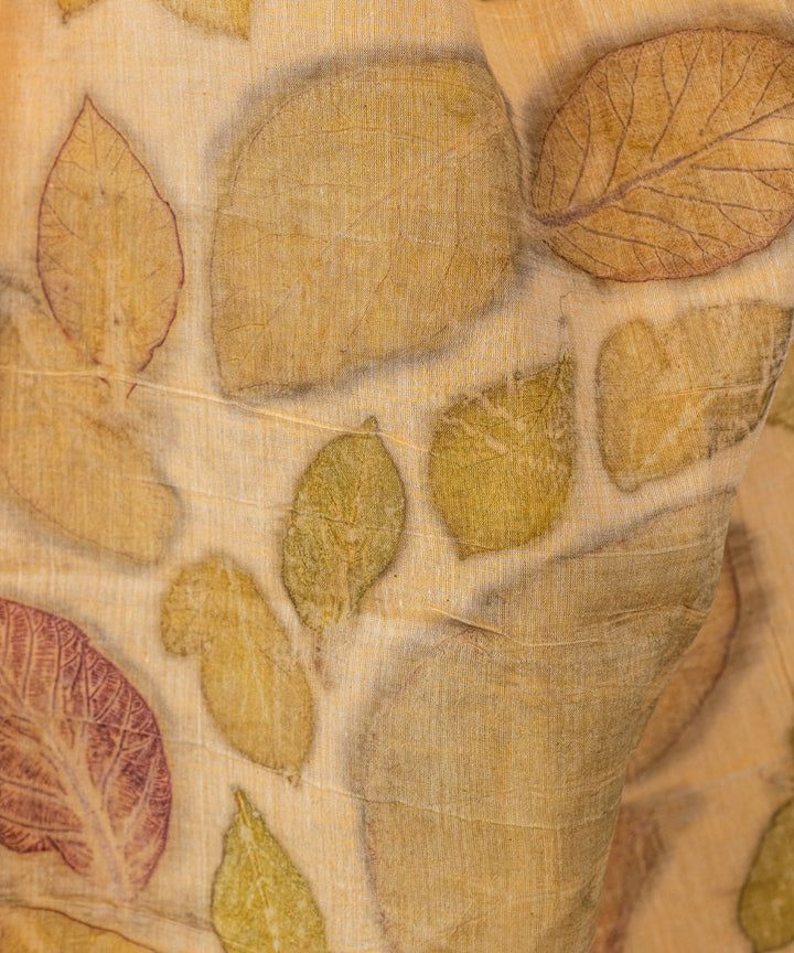Soft pumpkin orange cotton hand dyed with turmeric bio print saree
