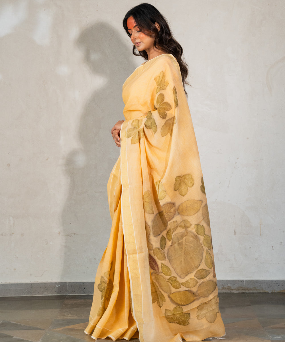 Soft pumpkin orange cotton hand dyed with turmeric bio print saree