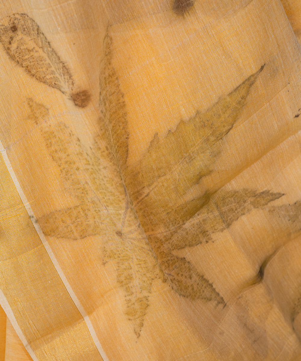 Soft pumpkin orange cotton hand dyed turmeric bio print saree