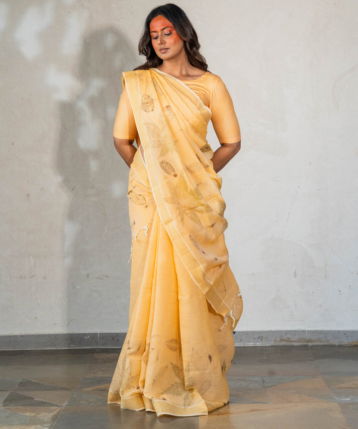 Soft pumpkin orange cotton hand dyed turmeric bio print saree