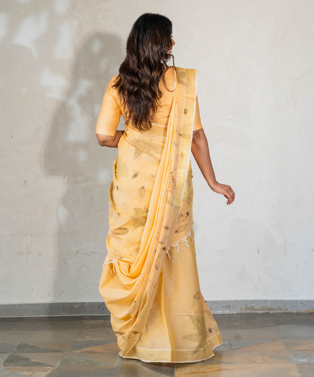 Soft pumpkin orange cotton hand dyed turmeric bio print saree