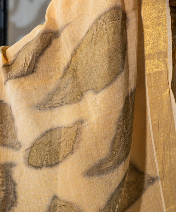 Soft pumpkin orange cotton hand dyed with turmeric bio printed saree