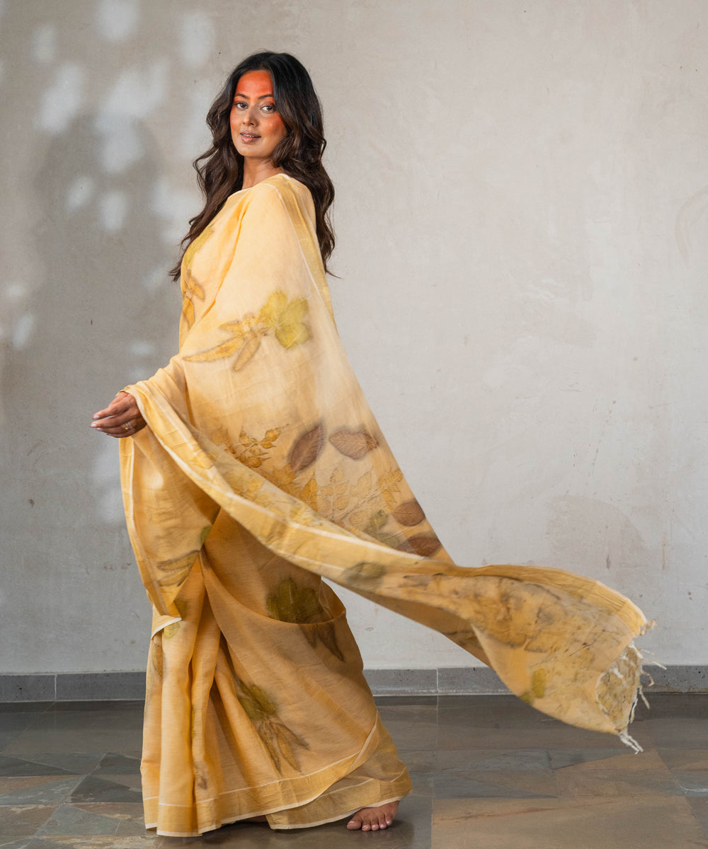 Soft pumpkin orange hand dyed with turmeric cotton bio print saree