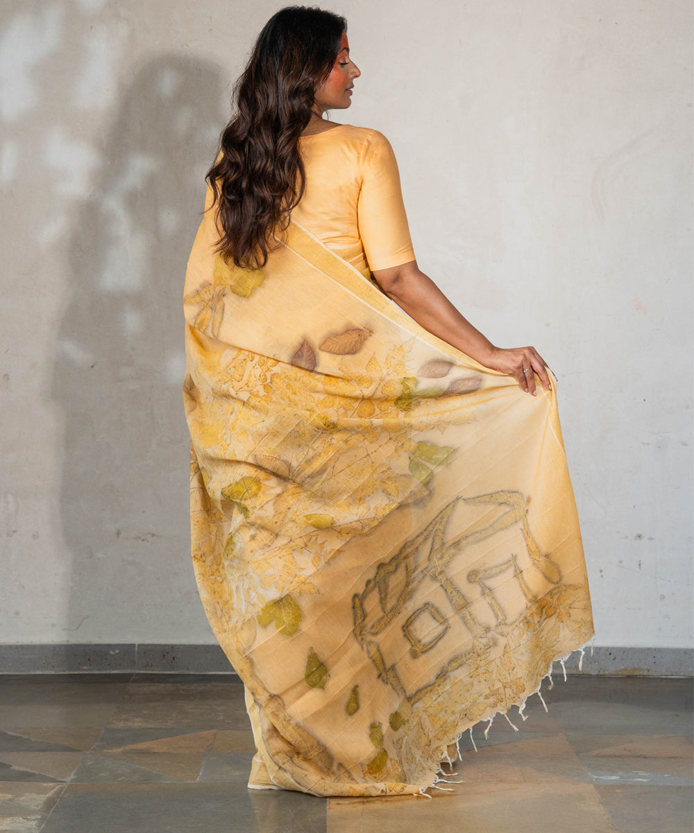 Soft pumpkin orange hand dyed with turmeric cotton bio print saree