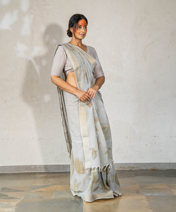 Ash grey hand dyed with iron ore bio printed cotton saree