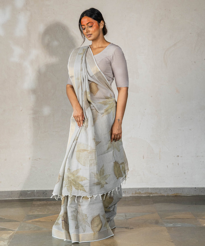 Ash grey hand dyed with iron ore bio printed cotton saree