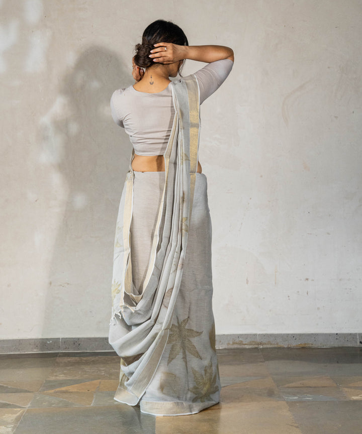 Ash grey hand dyed with iron ore bio printed cotton saree