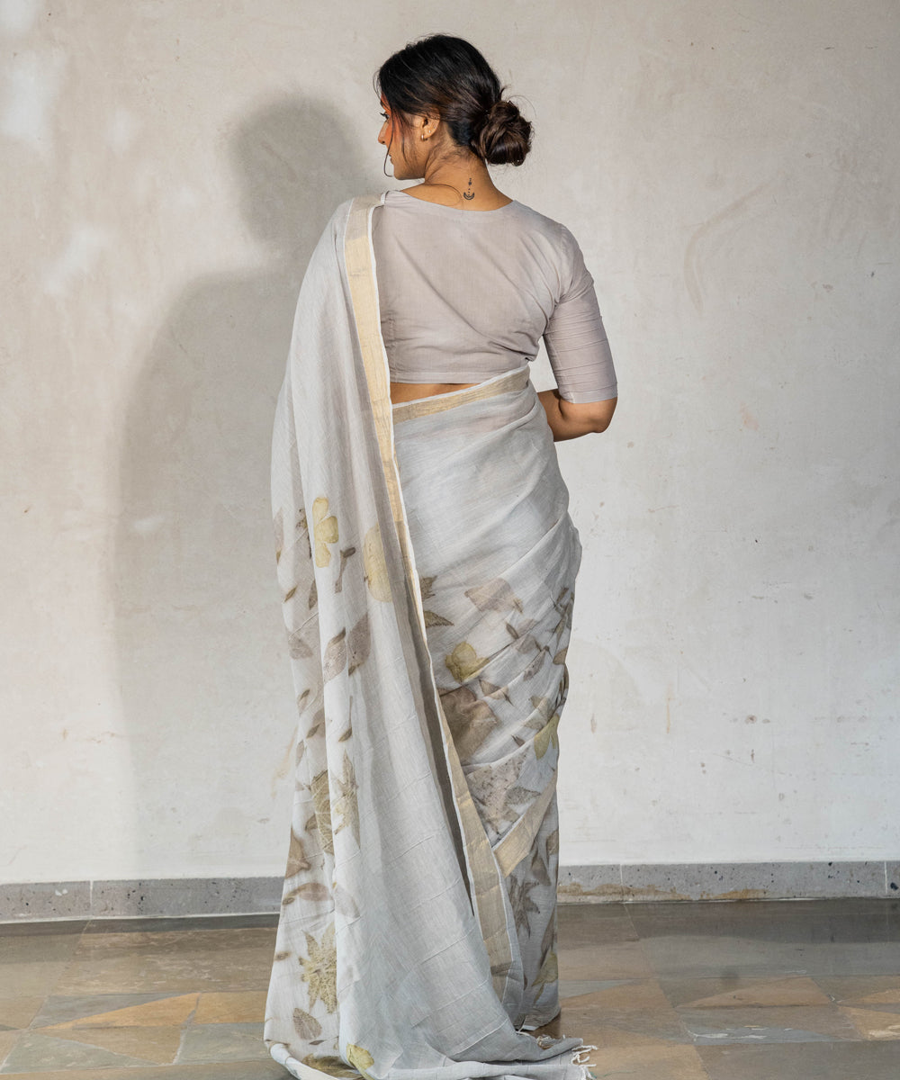 Ash grey cotton hand dyed with iron ore bio printed saree