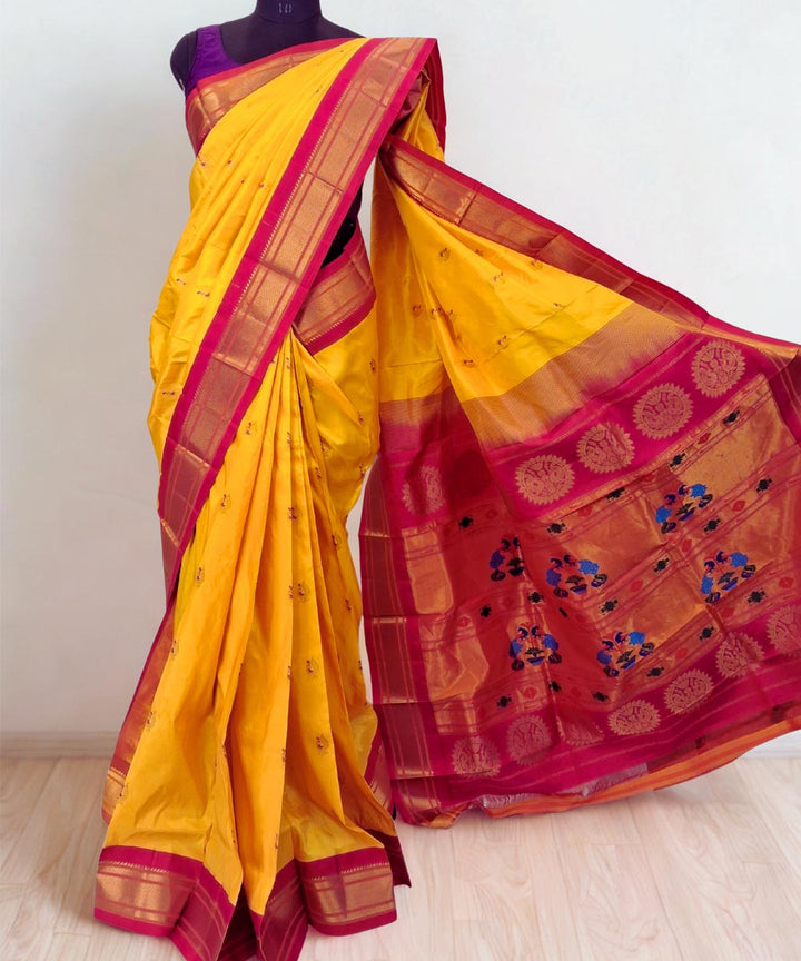 Canary yellow peacock butti silk paithani saree with pink border
