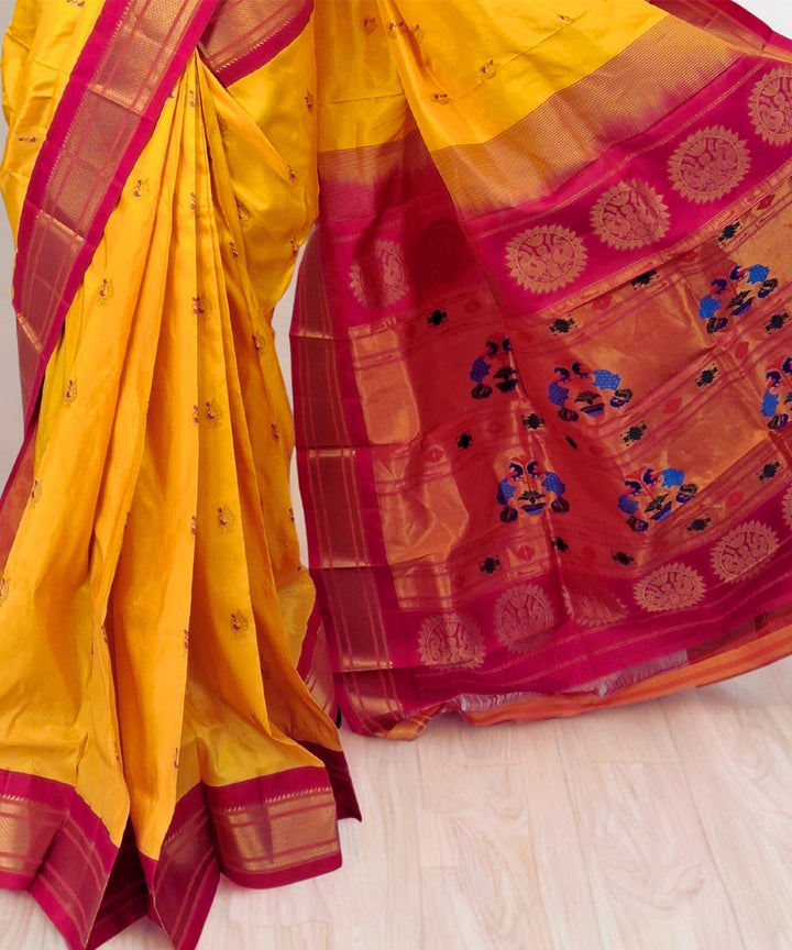 Canary yellow peacock butti silk paithani saree with pink border