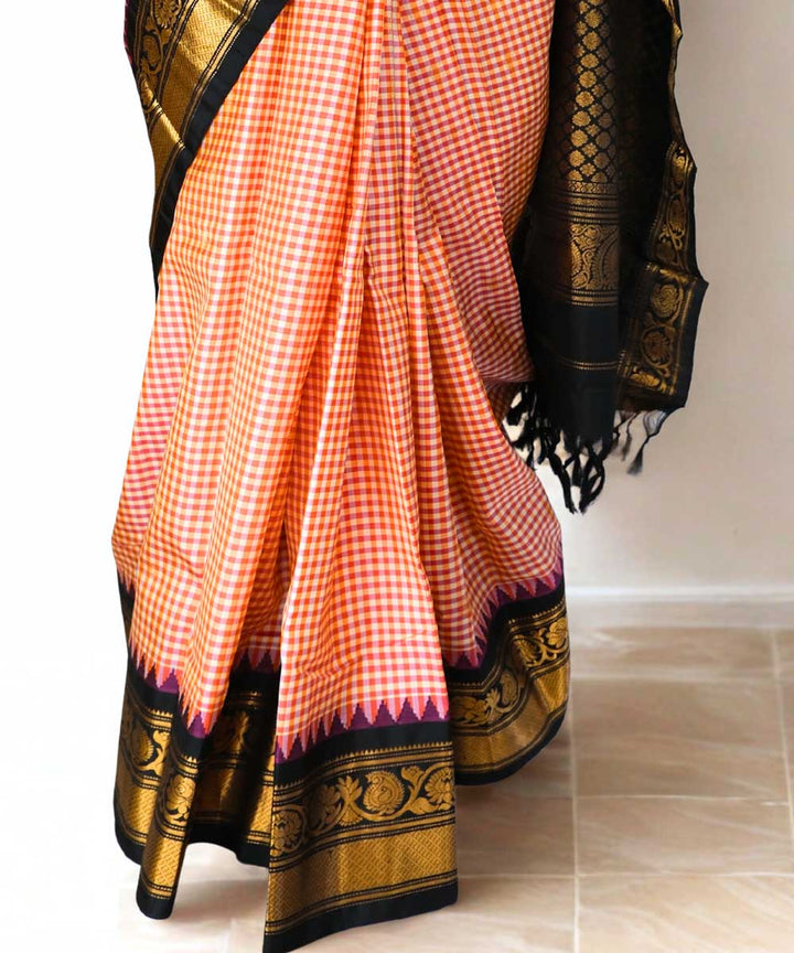 Red and peach checks silk gadwal saree with temple border