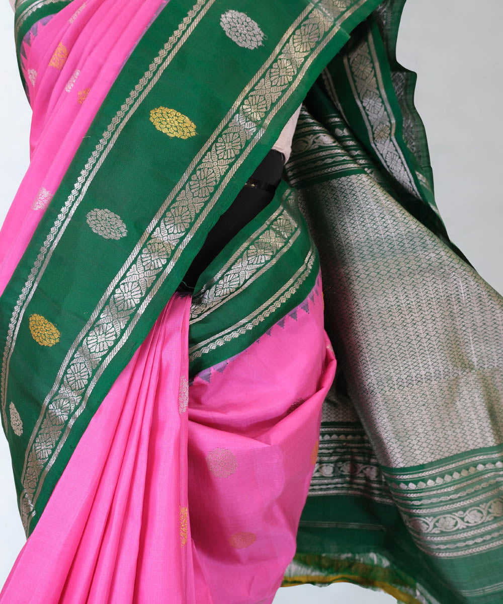 Pink gadwal silk saree with green temple border