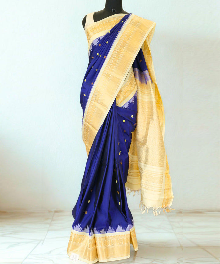 Navy blue silk gadwal saree with beige border