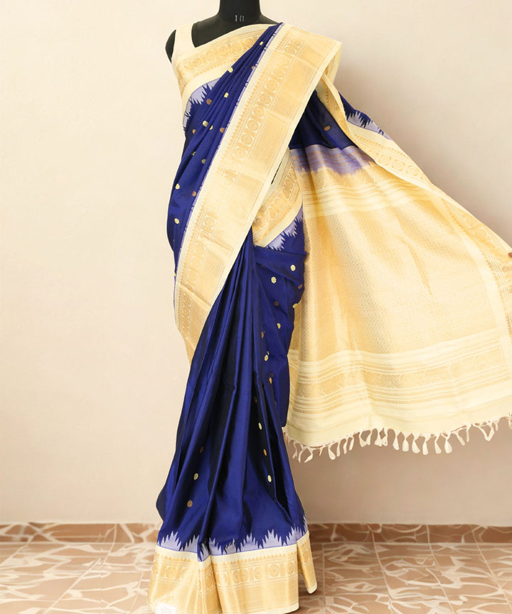 Navy blue silk gadwal saree with beige border