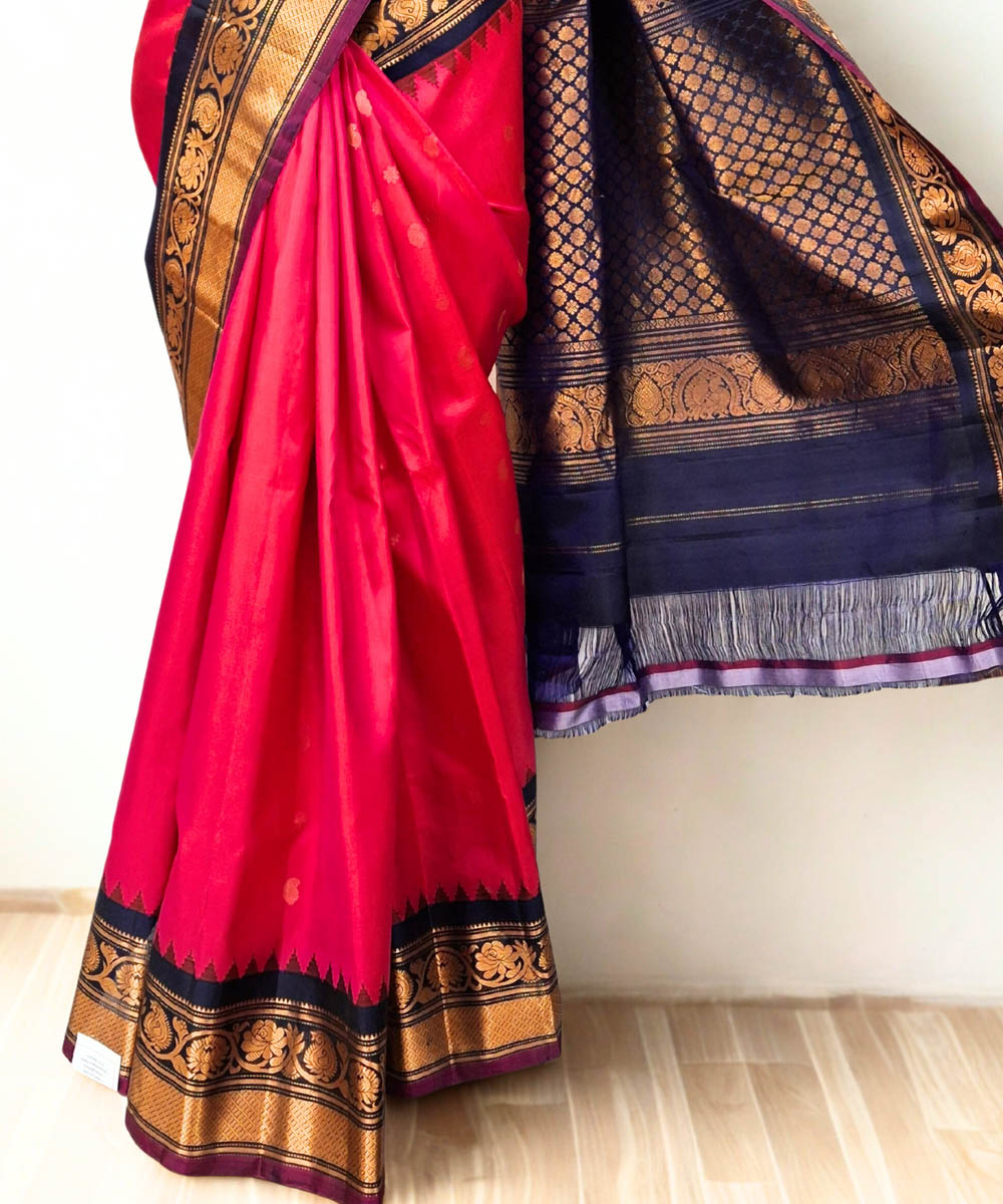 Fuchsia pink silk gadwal saree with temple border