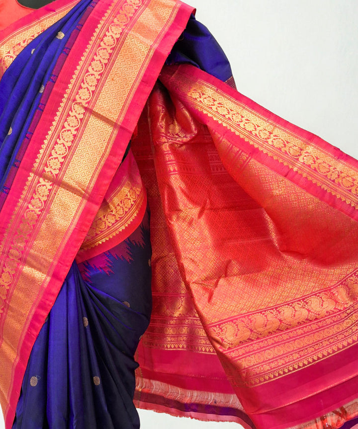 Navy blue silk gadwal saree with temple border