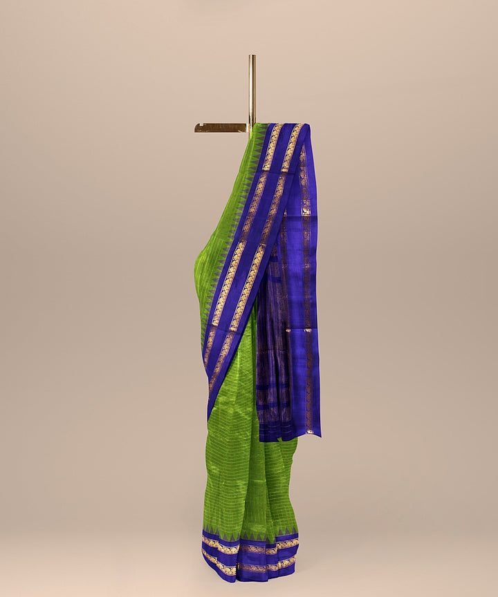 Dark green violet handwoven gadwal silk saree