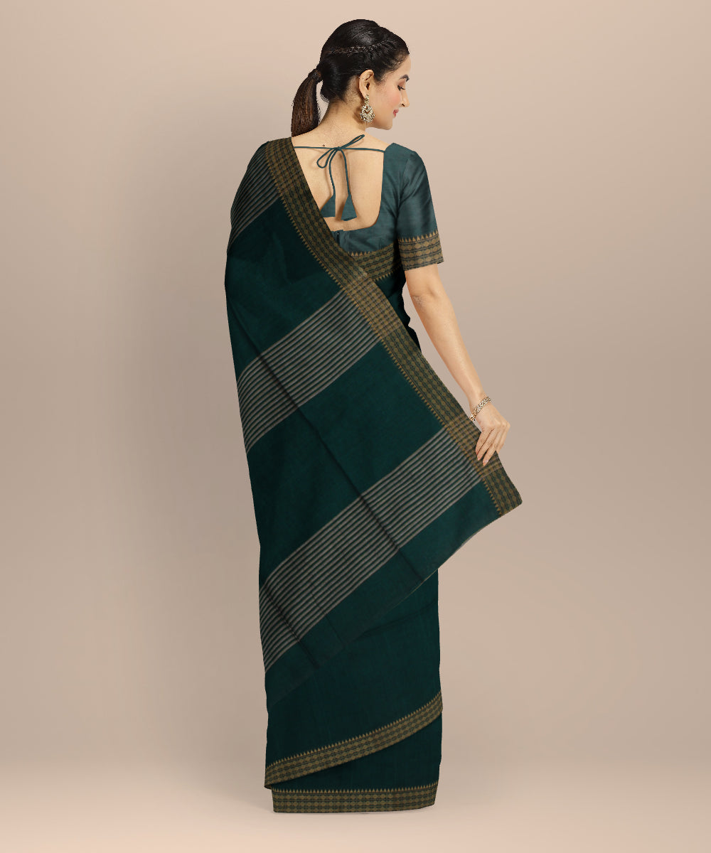 Dark green plain handwoven cotton jamdani saree