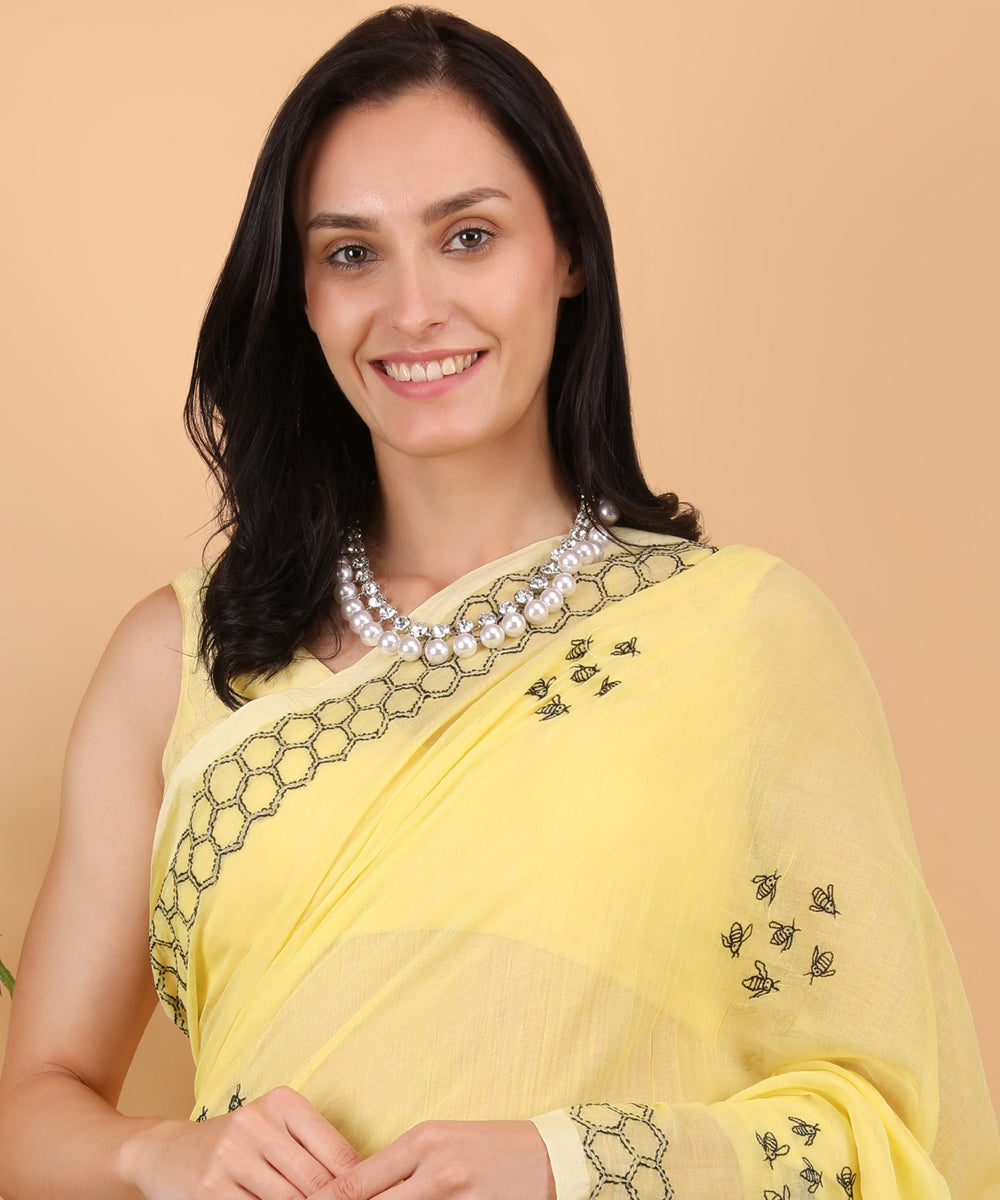 Yellow black cotton hand embroidered chikankari saree