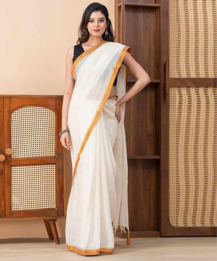 Cream golden border cotton handloom shantipuri saree